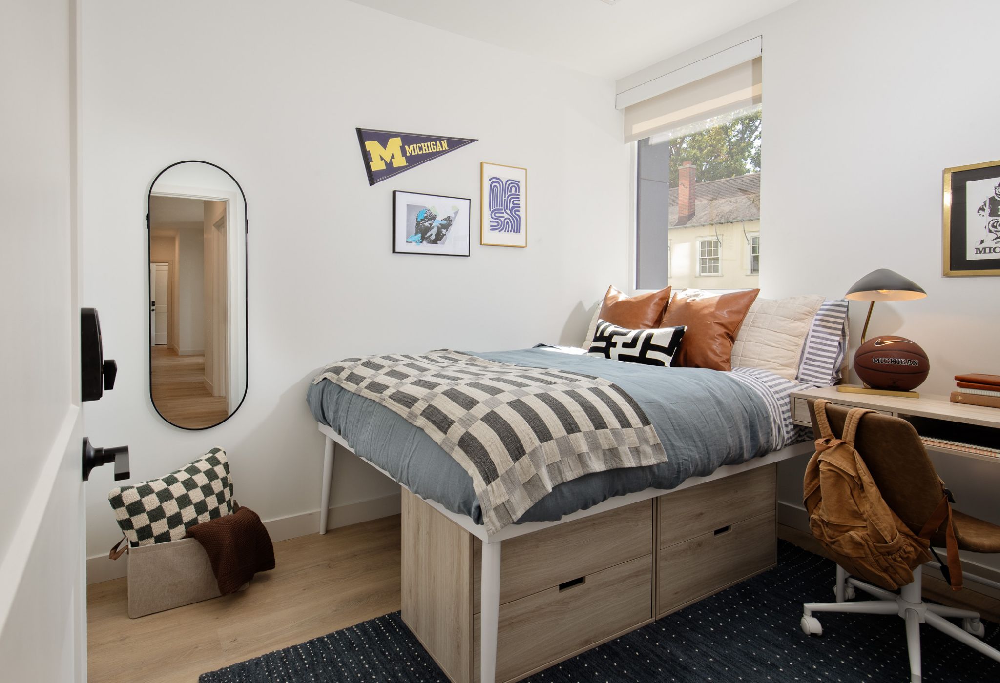 VERVE Ann Arbor student apartment bedroom with large window, bed, and desk with USB outlets